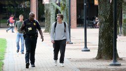 JCCC police officer chatting a student in Fountain Square