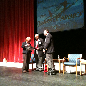 Side view of Tuskegee Airmen on stage