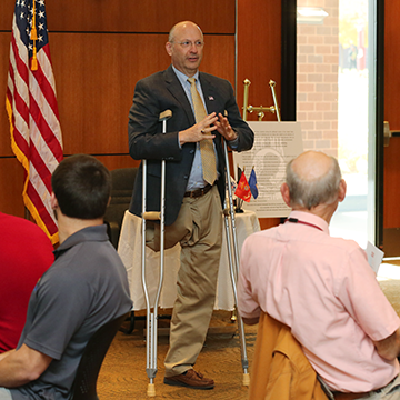 Greg Musil, Chair of the JCCC Board of Trustees addresses veteran employees