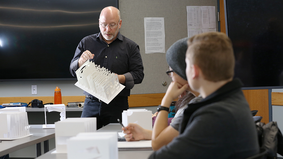 Students listening to an architecture class lecture