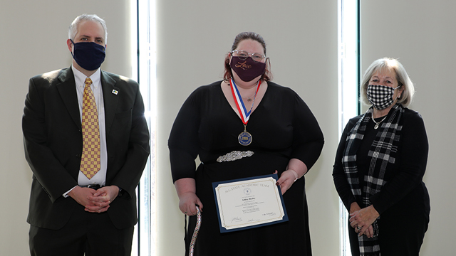 Group photo of Ashley Hooley-Lickteig and JCCC Trustees Lee Cross and Nancy Ingram.