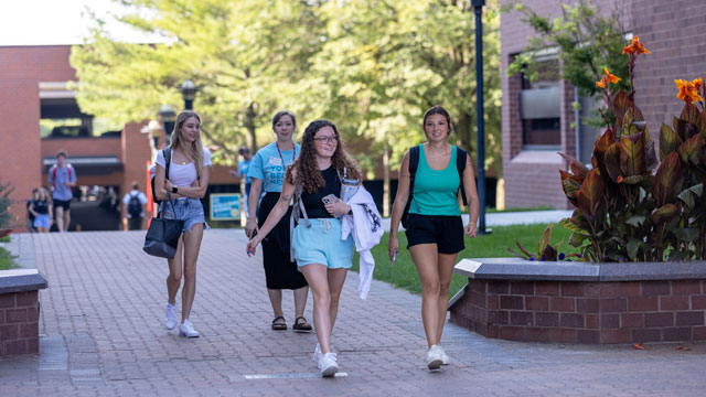 Students walking across campus